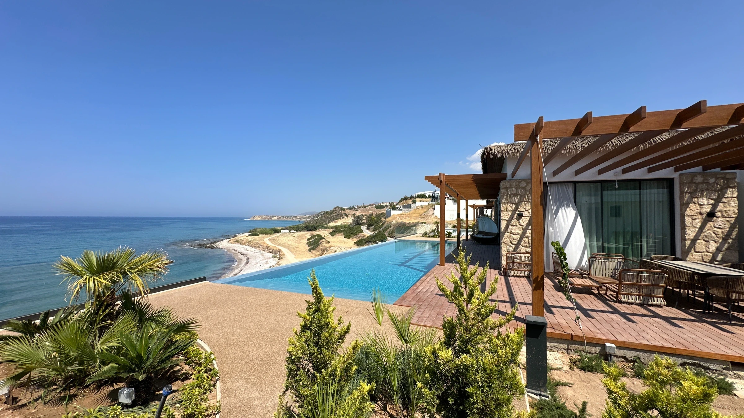 Esentepe villa terrace and infinity pool beside the coast